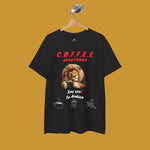 Black t-shirt with a lion holding a coffee cup and text Coffee Anonymous. Kirenge Gold Coffee Anonymous T-shirt
